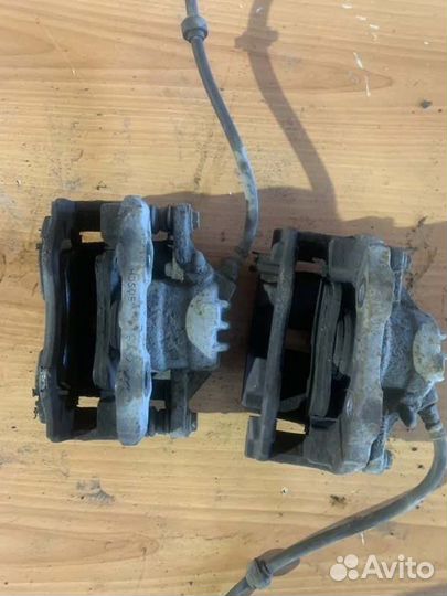 Суппорт тормозной передний левый Peugeot 208