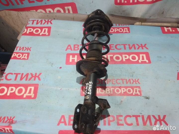 Стойка передняя правая Nissan March K12