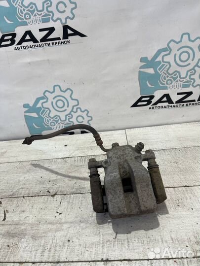 Суппорт задний правый Toyota RAV 4 3