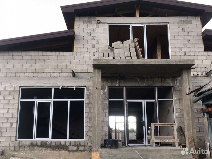 Пластиковые окна двери балконы