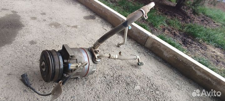 Компрессор кондиционера Шевроле нива