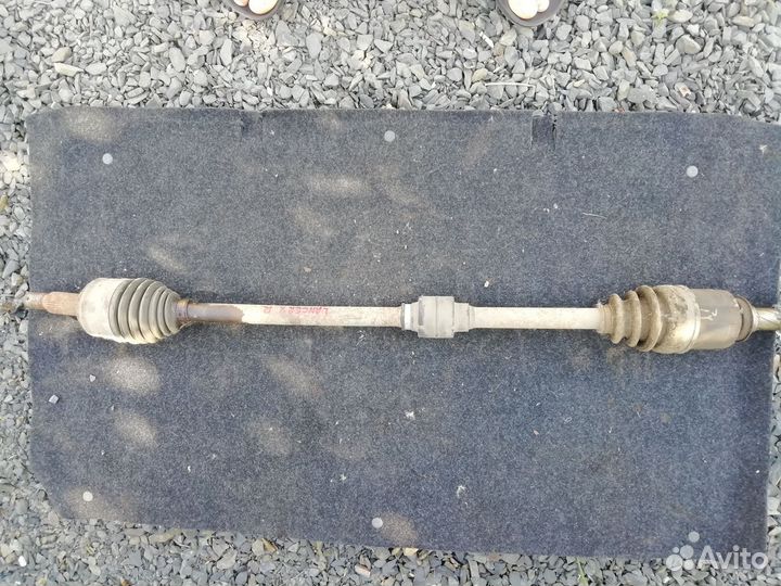 Привод правый Мицубиши Лансер 10