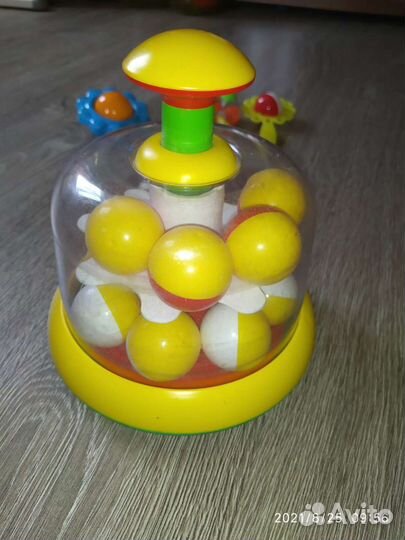 Юла-карусель и погремушки