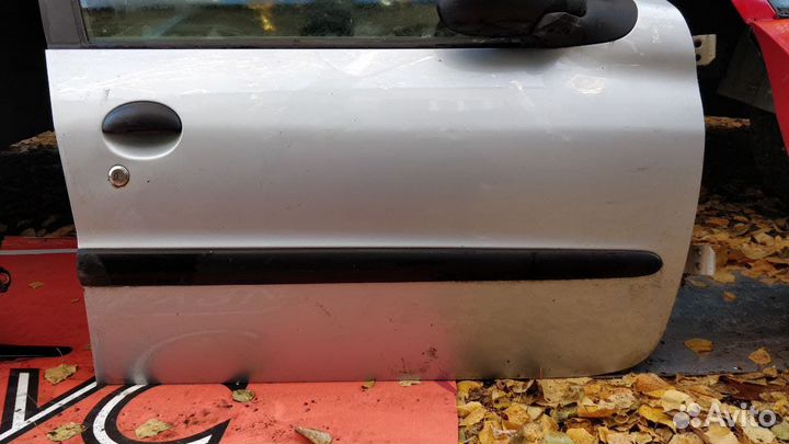 Дверь передняя правая Пежо 206