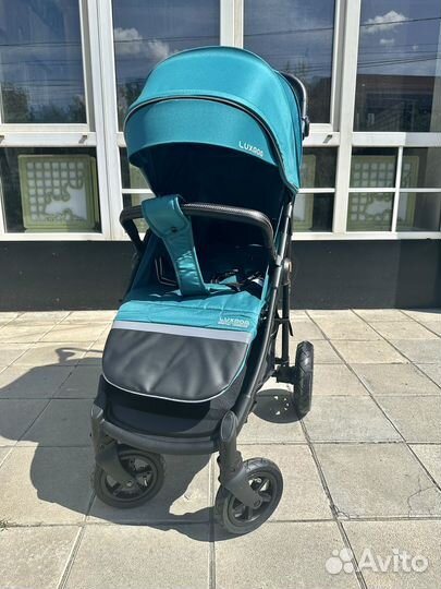 Коляски новые с надувными колесами
