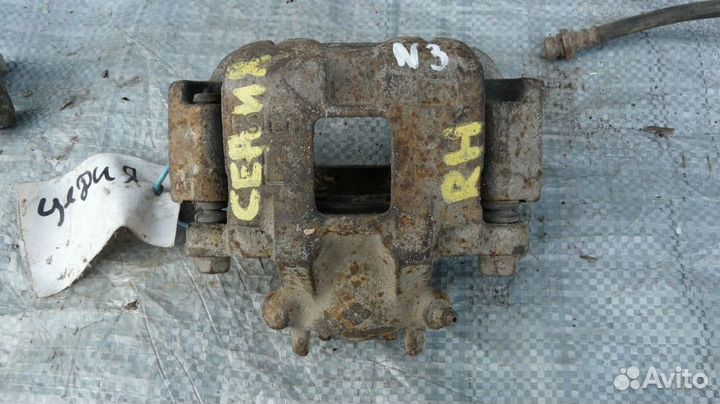 Суппорт торм пер правый Mitsubishi Lancer Cedia