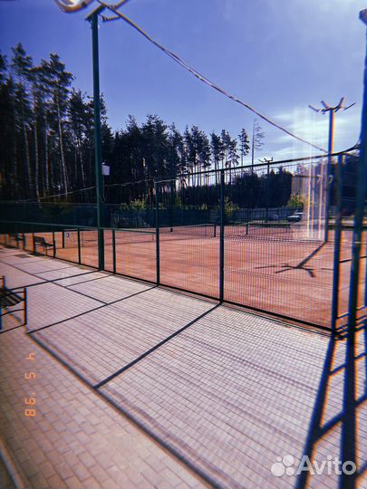 Тренер по большому теннису