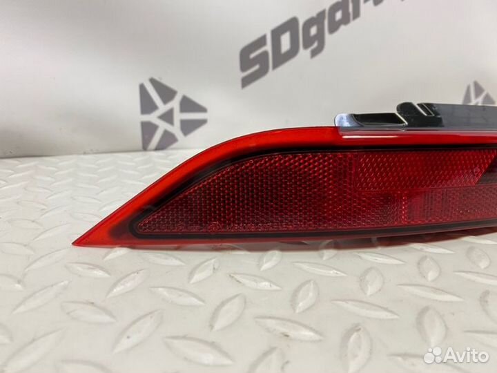 Фонарь противотуманный задний левый Land Rover