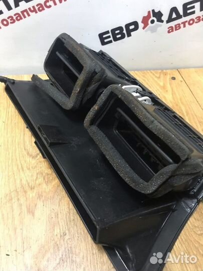 Дефлектор воздушный центральный Geely Emgrand X7