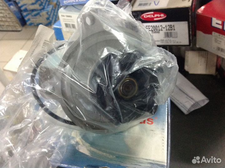 Водяная помпа на Audi 100,2.4 см