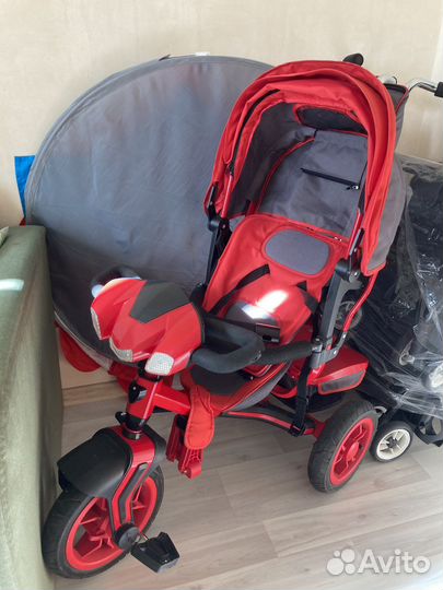 Трехколесный велосипед с ручкой