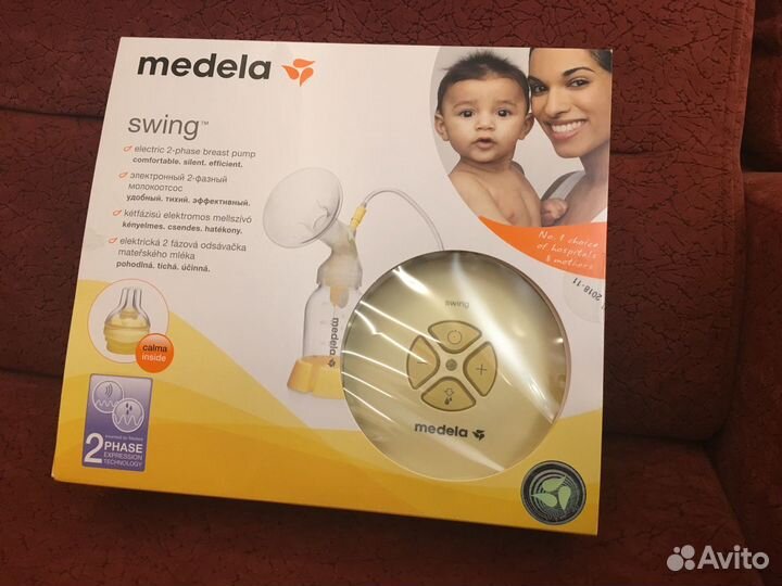 Молокоотсос Medela swing электрический