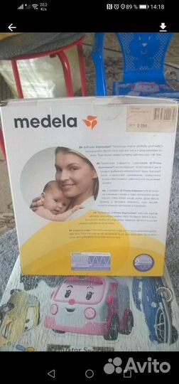 Молокоотсос medela