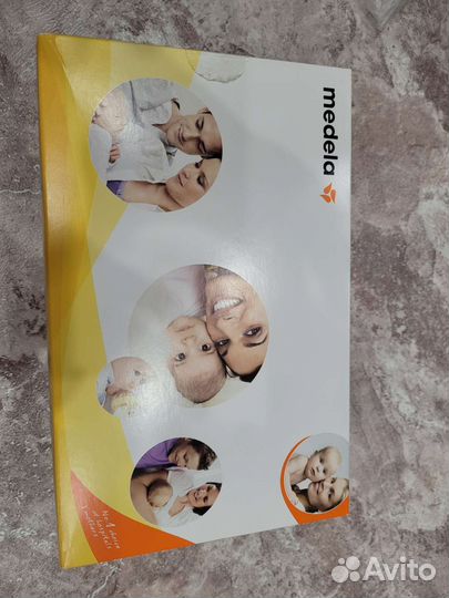 Молокоотсос medela ручной