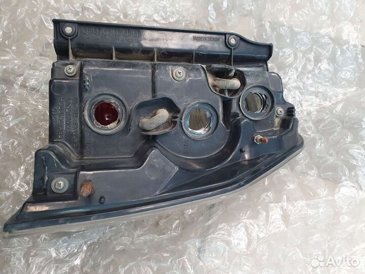 Фонарь левый Mitsubishi Pajero 4