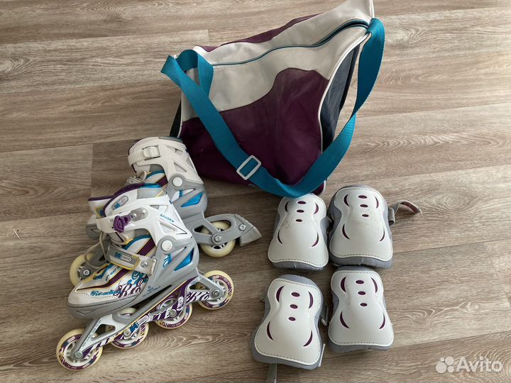 Роликовые коньки