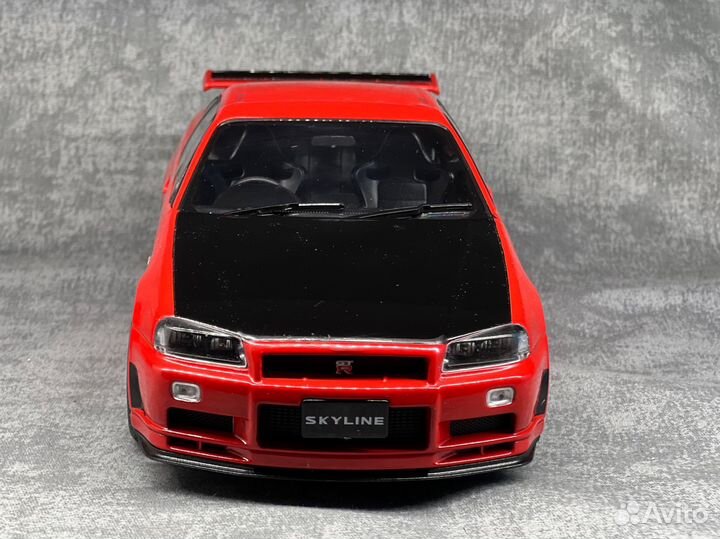 Модель nissan skyline r34 1/18 solido