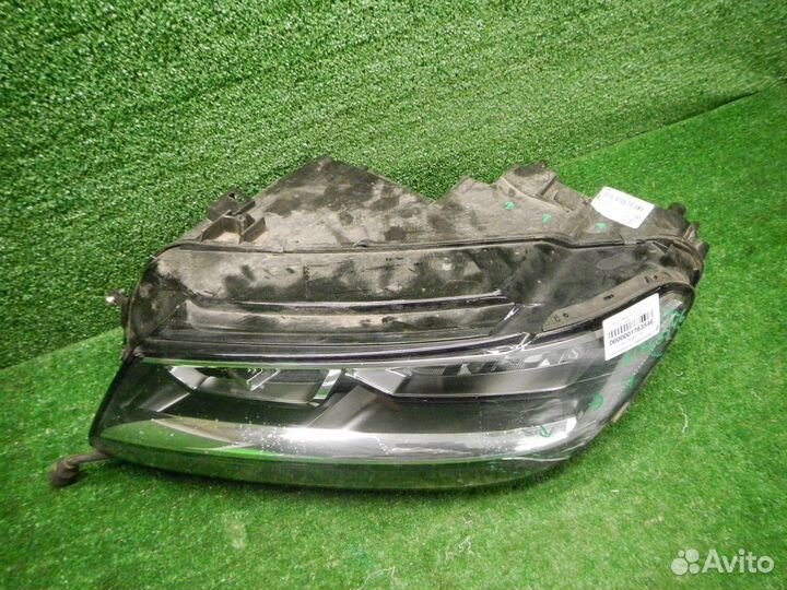 Фара левая Volkswagen Tiguan