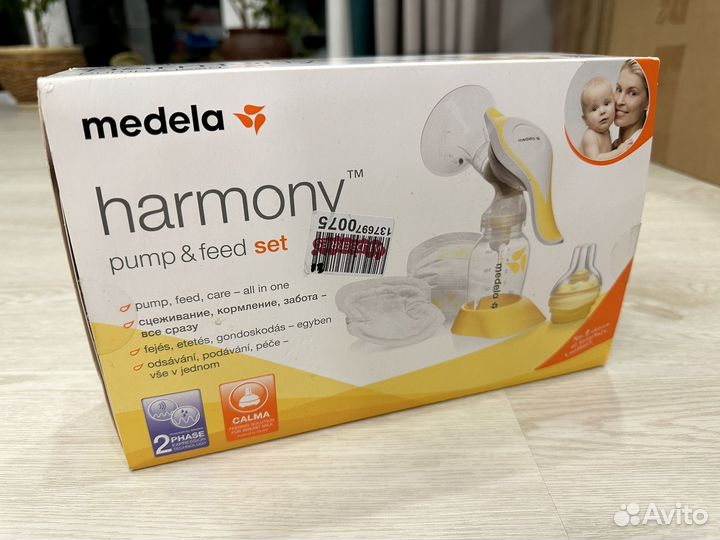 Молокоотсос ручной medela calma соска
