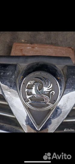 Решетка радиатора opel astra h доРест