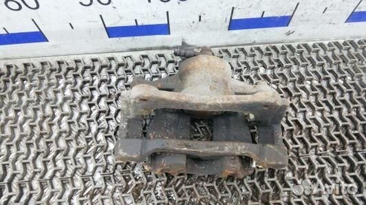 Суппорт тормозной передний левый toyota corolla ve