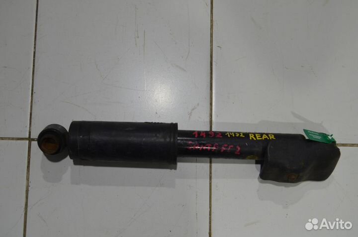 Стойка амортизатора задняя Hyundai Santa Fe CM 2.7