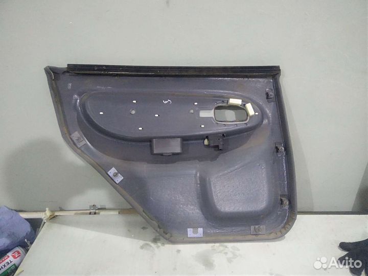 Обшивка двери, дверная карта, Kia Spectra