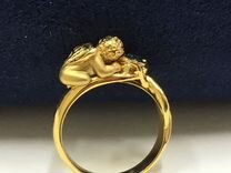 Золотое кольцо с топазом ангел