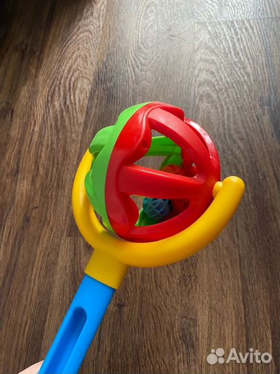Игрушка каталка с ручкой