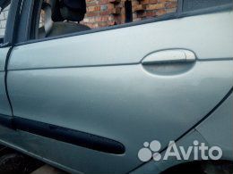 Дверь Рено Сценик