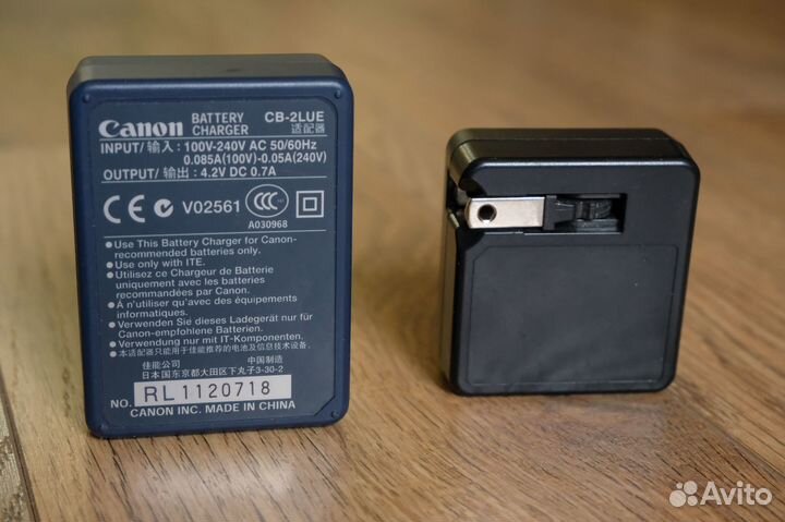 Зарядное Canon CB-2LUE и адаптер Olympus