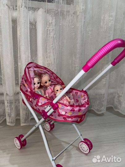 Коляска с куклами