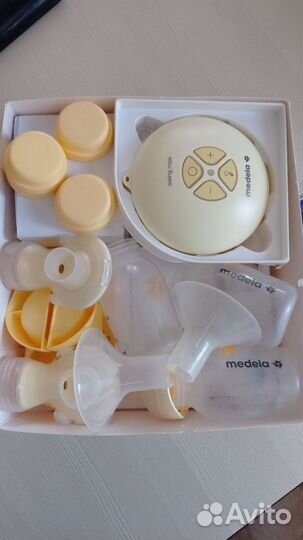 Молокоотсос medela электрический