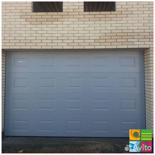 Секционные ворота для гаража alutech