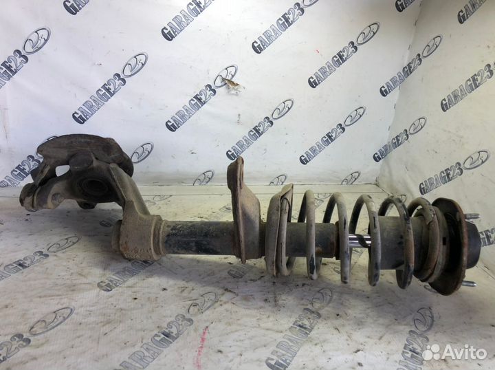 Стойка амортизатора левая Chevrolet Lanos в сборе