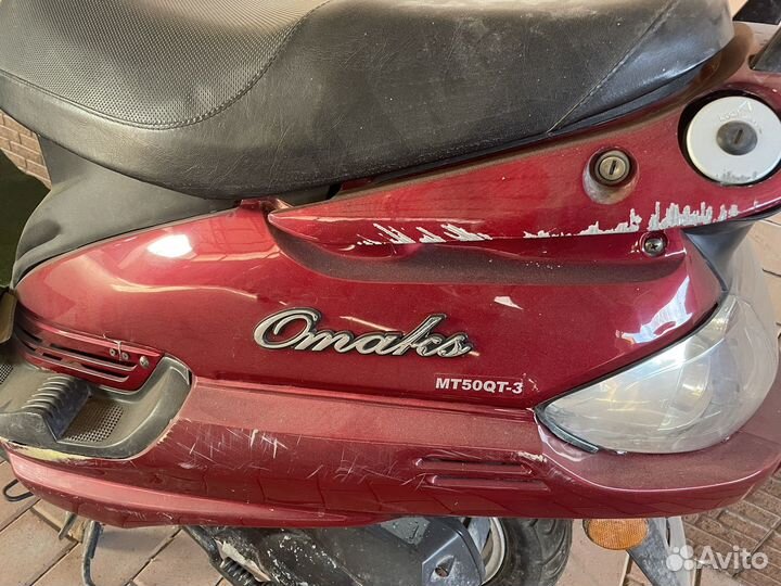 Скутер Omaks