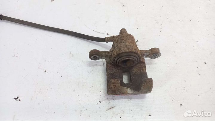 Суппорт задний левый Hyundai Tucson 2