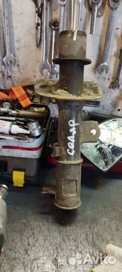 Передние стойки аммортизатора Солярис Рио 2012г