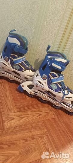 Роликовые коньки