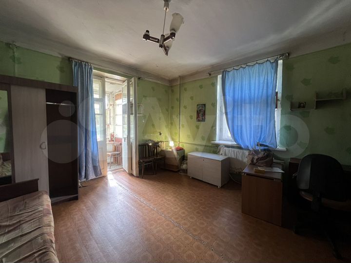 Доля в 2-к. квартире, 58 м², 2/2 эт.