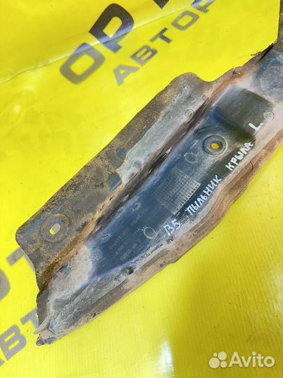 Пыльник крыла передний левый Volkswagen Passat B5