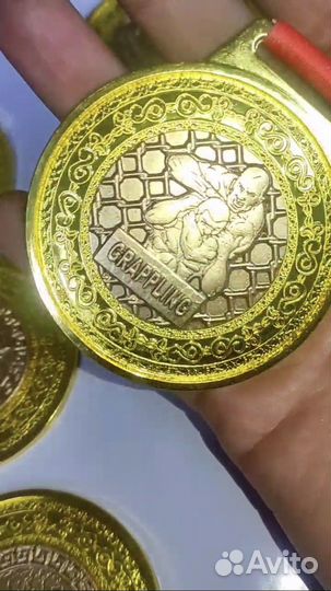 Медали награды кубки статуэтки