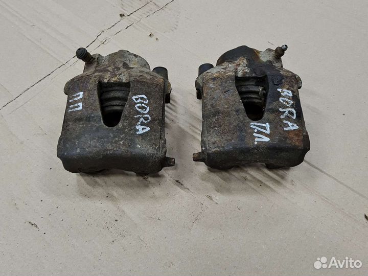 Суппорт передний Volkswagen Bora A4 Фольксваген Го