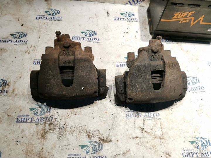 Суппорт тормозной передний Ford Focus III (2011—20