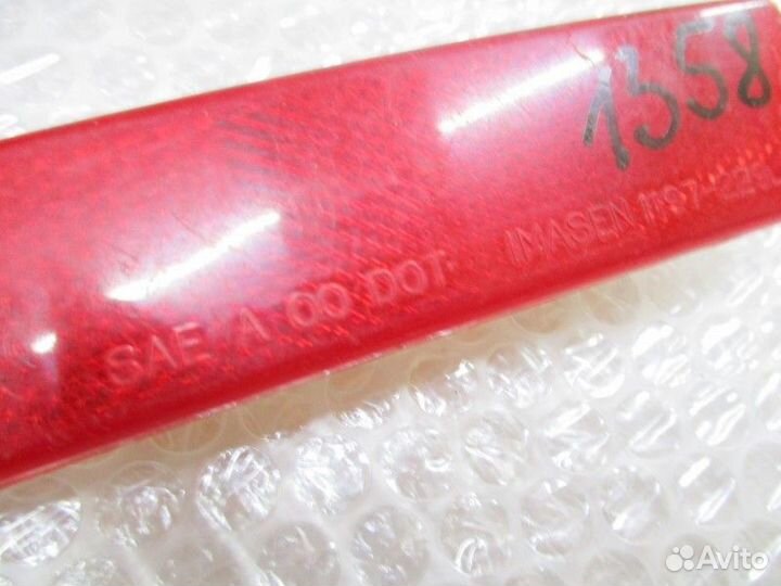 Отражатель в бампер задний левый Mitsubishi