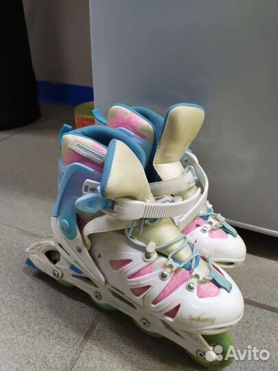 Роликовые коньки