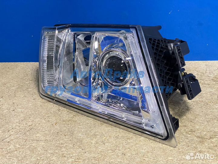 Фара Вольво FH FM левая ручная регулировка