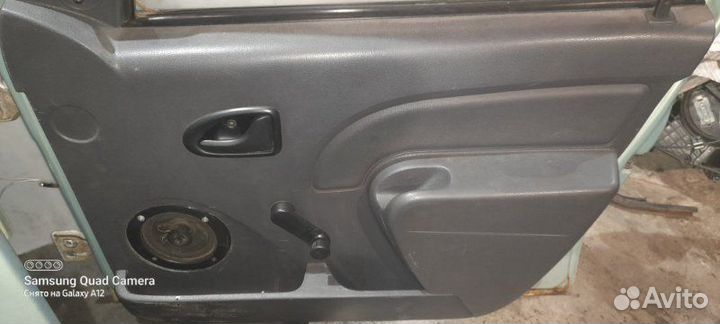 Обшивка двери передняя правая Renault Logan 1