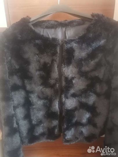 Жилетки меховые женские