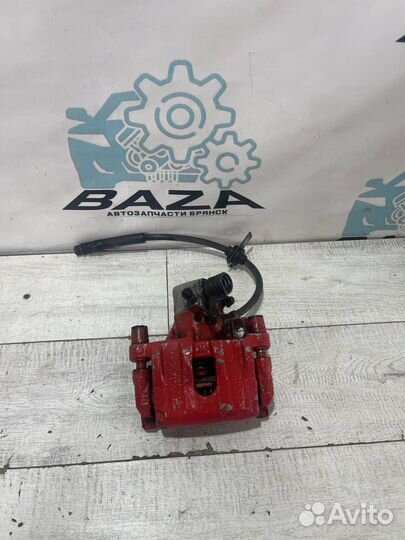 Суппорт задний правый Ford Focus 3